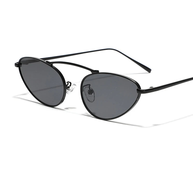 Unique oval cat eye sunglasses, fashionable triangular metal frame. 