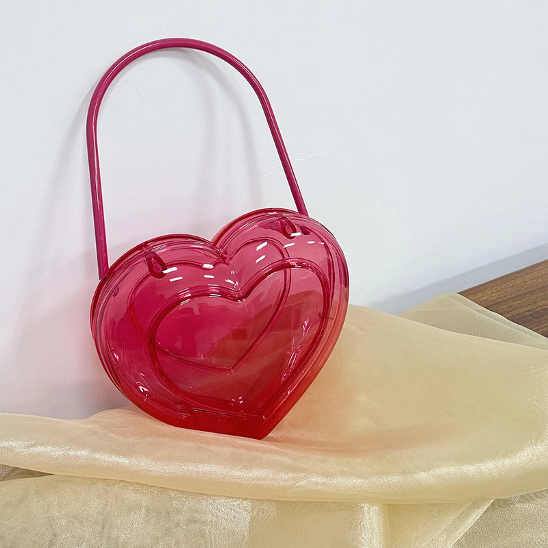 bolso acrílico en forma de corazón 